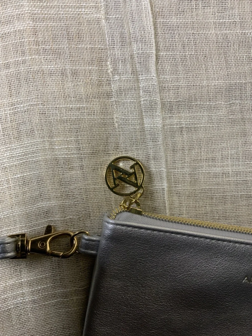 Adrienne Vittadini Silver charging wallet-wristlet